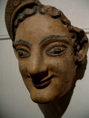 Etruscan, female head
